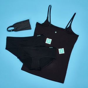 numa apparel laid out. numa tank top, numa undies, and numa headband