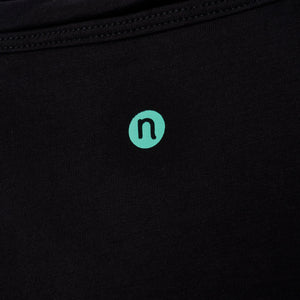 close up of numa logo on tank top